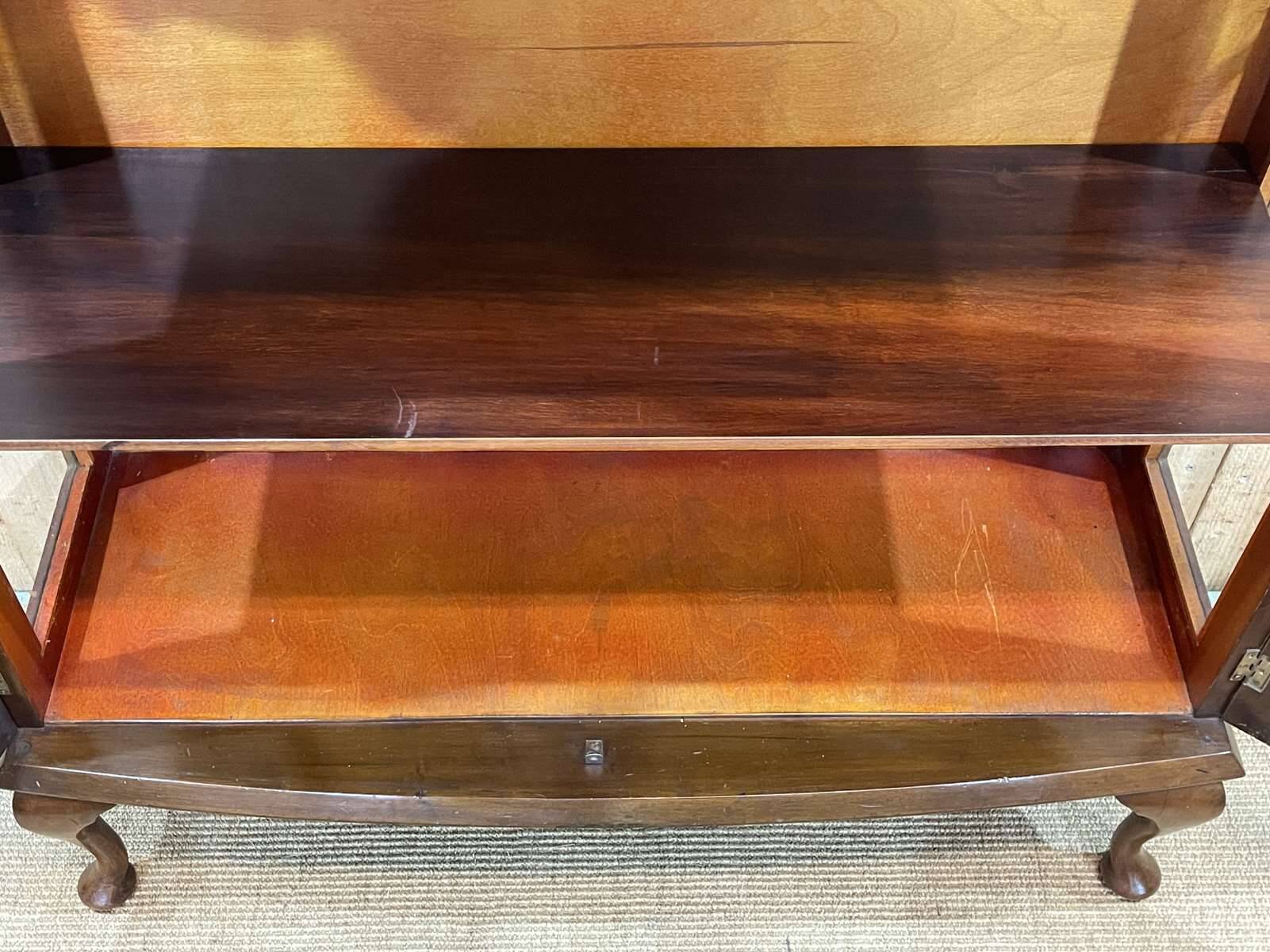 English Chippendale walnut display cabinet from the 1930s