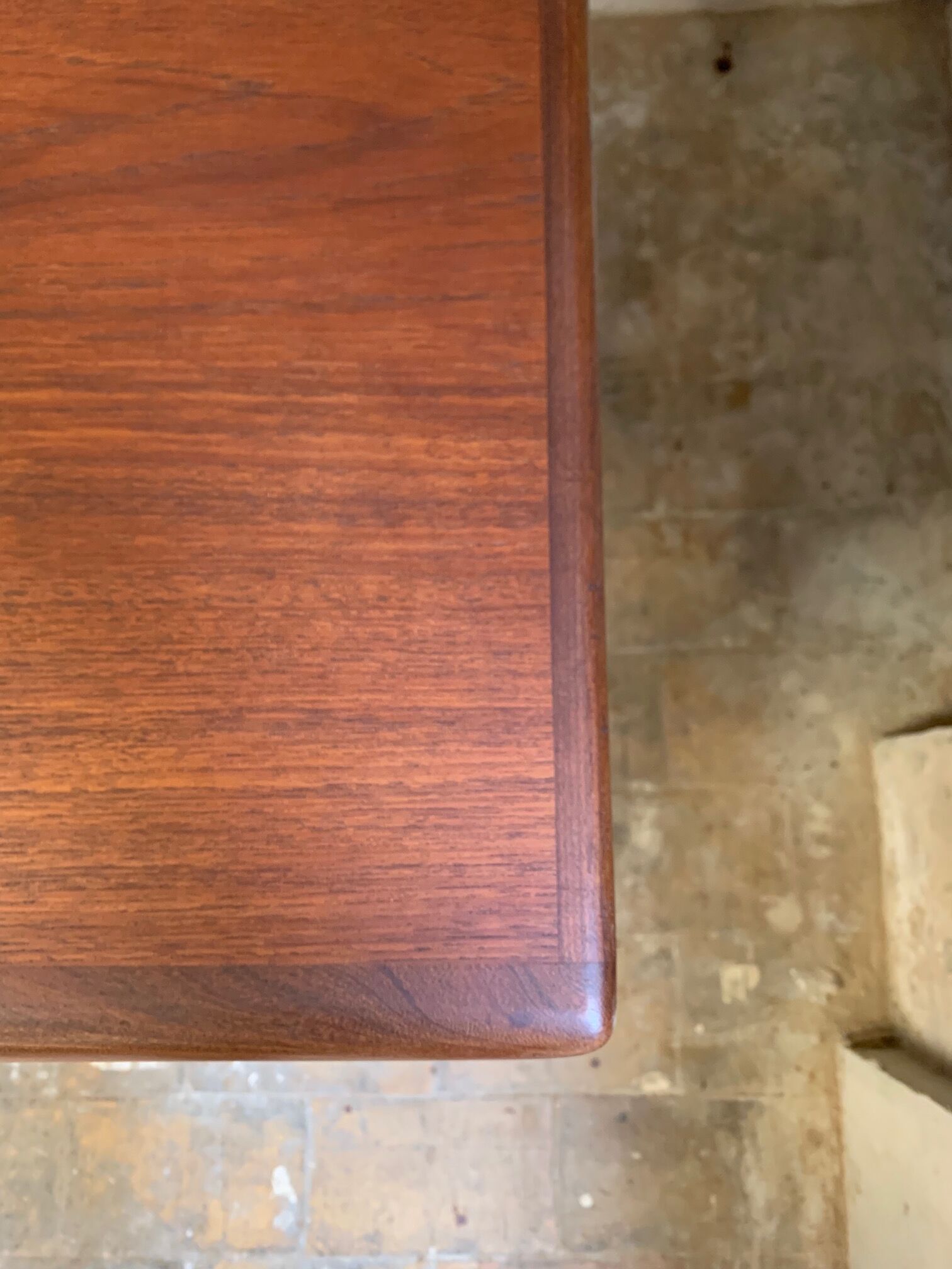 Dark teak dining table by Johannes Andersen for Uldum Møbelfabrik, Denmark