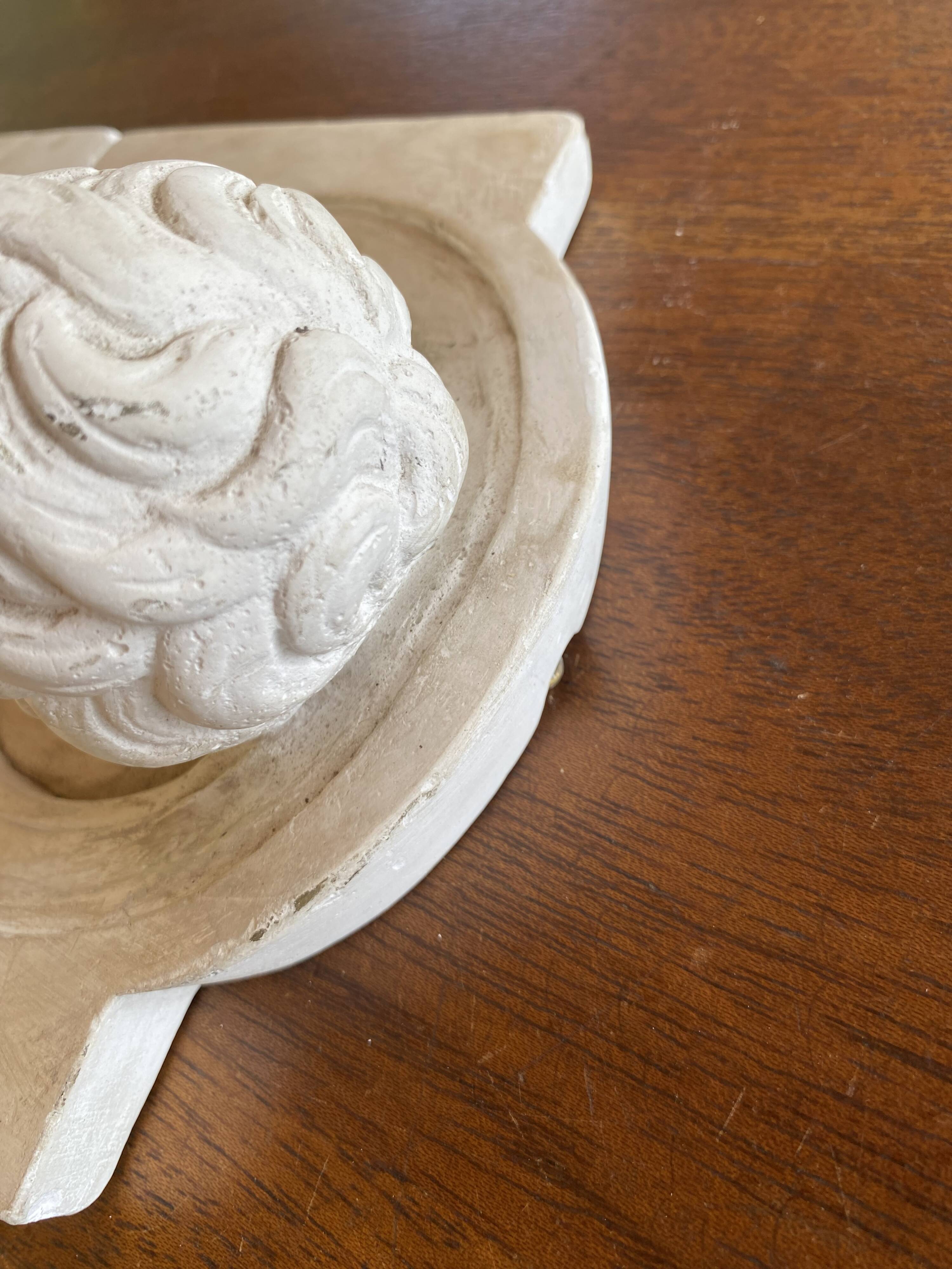 Two moulds; plaster heads