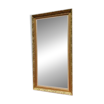 Wooden mirror and gold trim