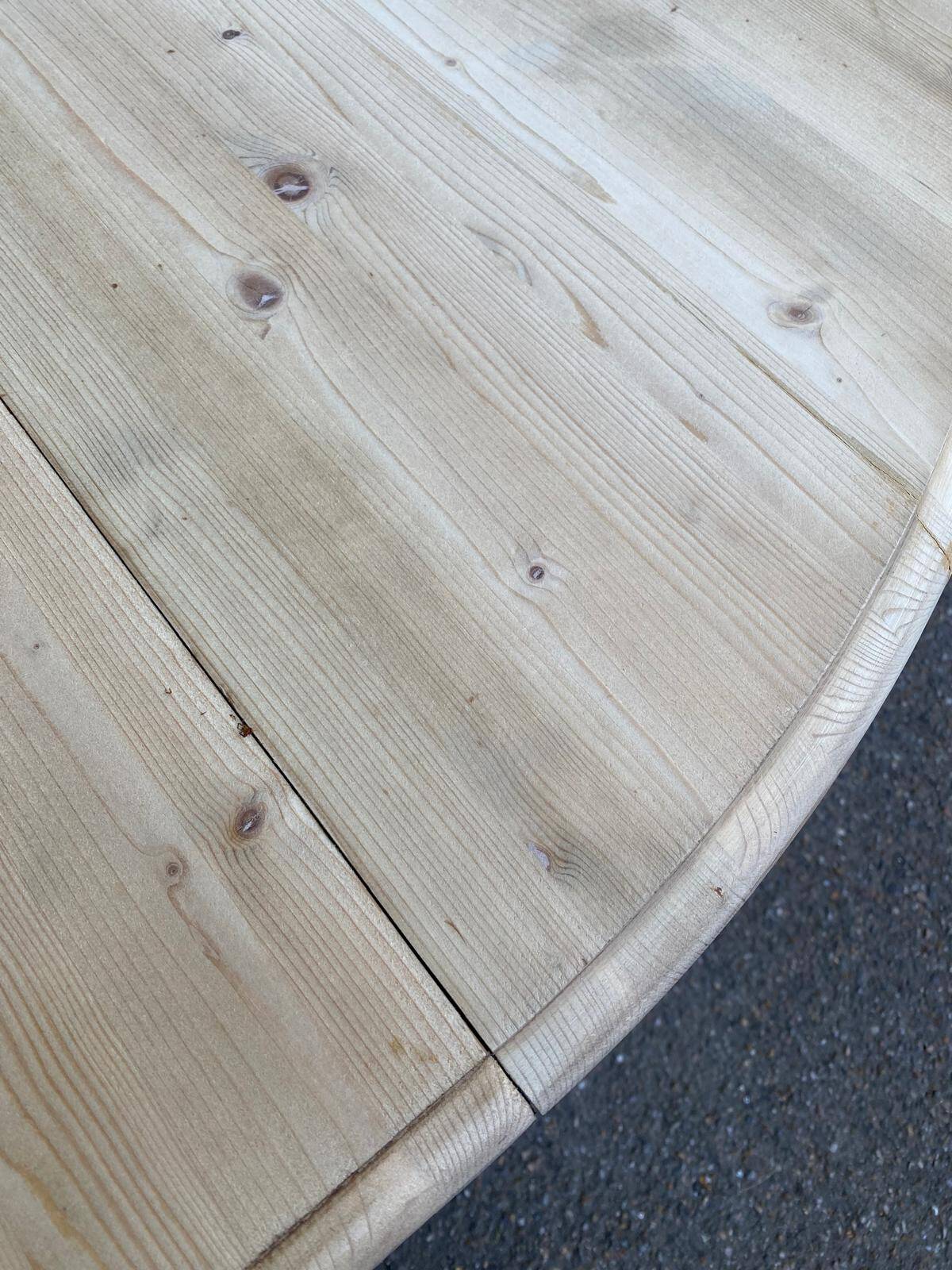 Interior's extendable round tripod dining table renovated in solid wood