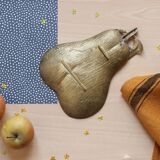 1960s gold-plated brass pear-shaped pocket emptier