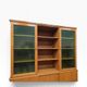 Vintage wooden display cabinet with green glass.