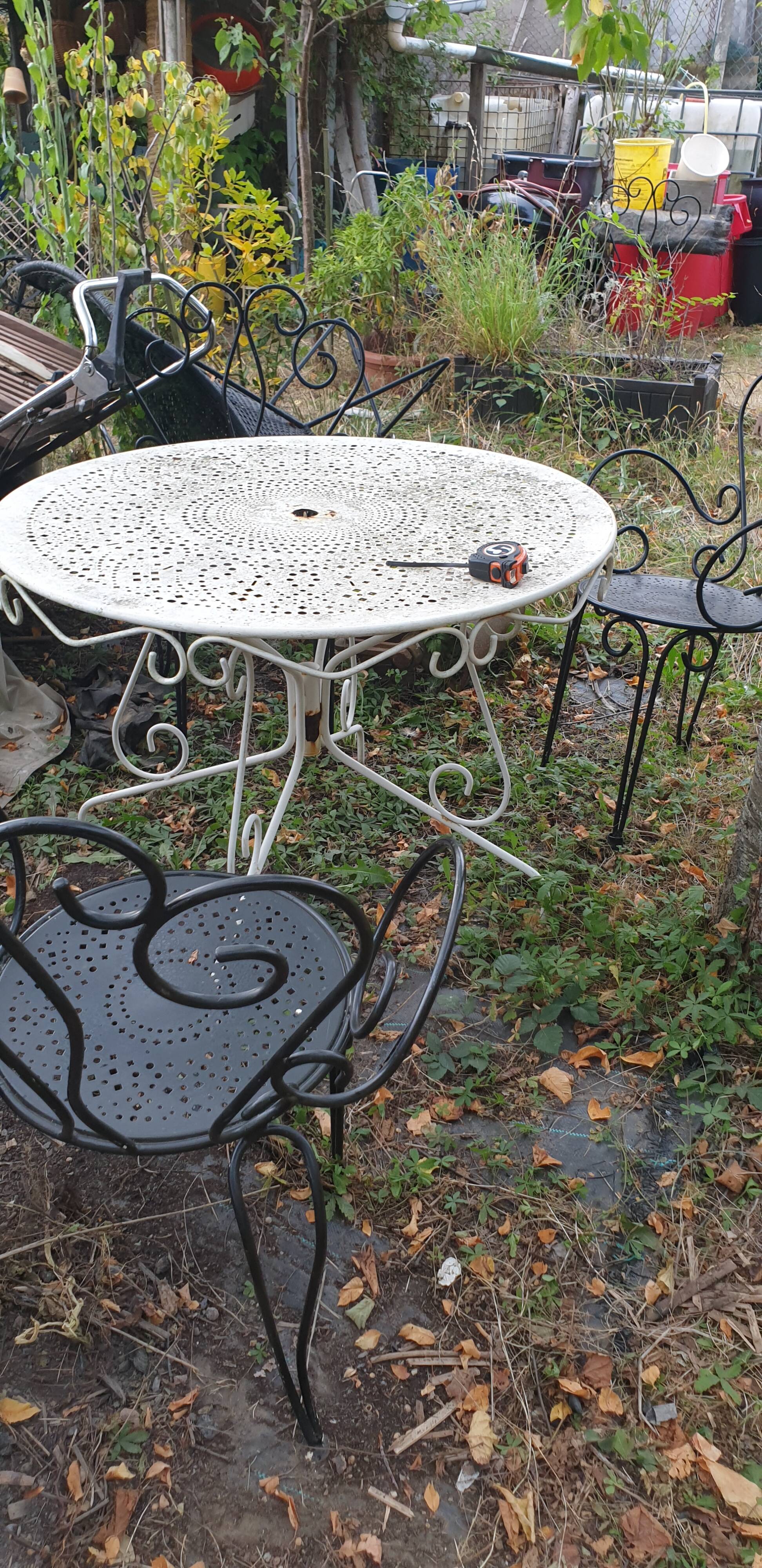 3 ornate wrought iron garden armchairs