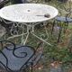 3 ornate wrought iron garden armchairs