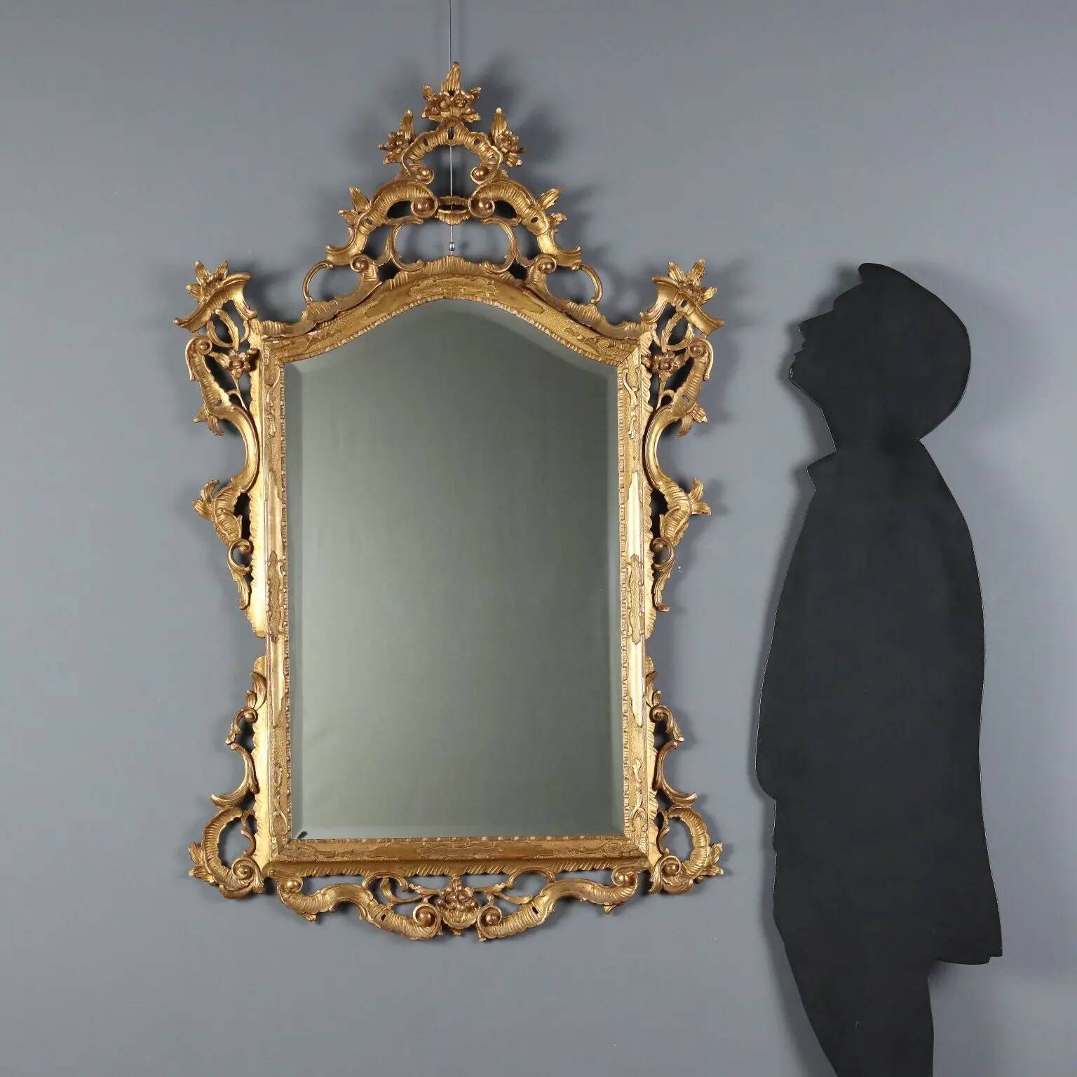 Antique baroque mirror in carved and gilded wood, Italy, 20th century