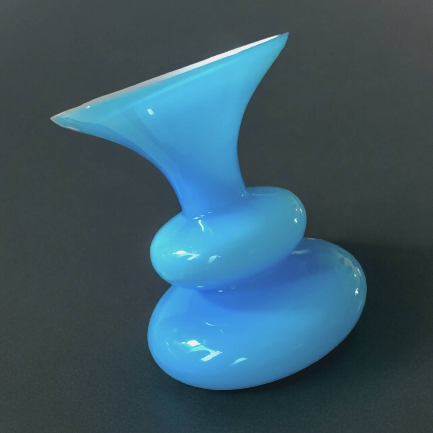 Small Space Age Design vase in blue molded glass