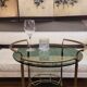 Table d'appoint / barcart / serveuse milieu de siècle, laiton doré et verre fumé, années 70 - Italie.
