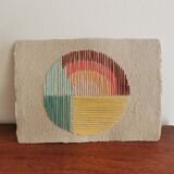 Rainbow embroidery on rag paper