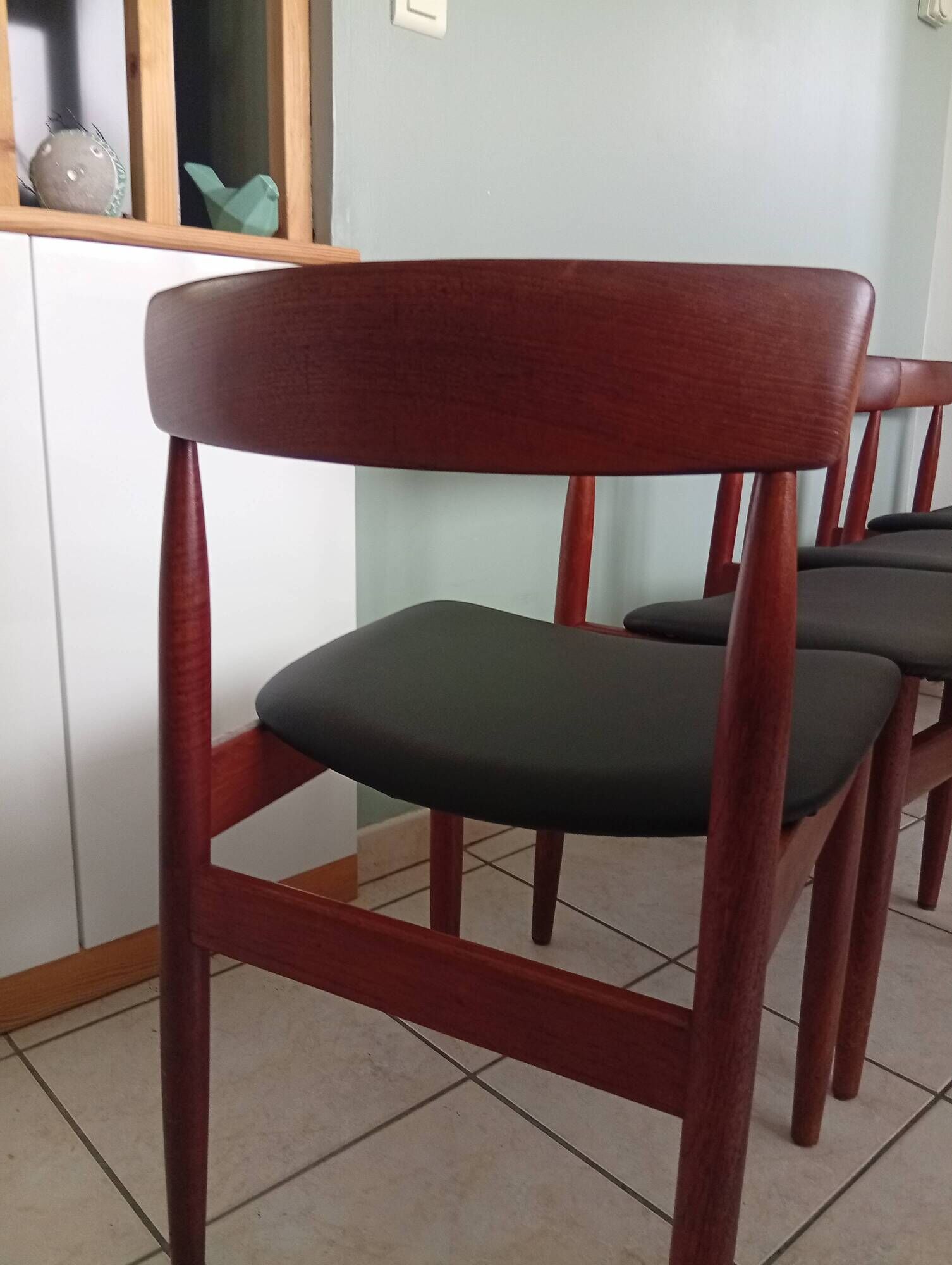 Four Danish mid-century teak armchairs.