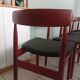 Four Danish mid-century teak armchairs.