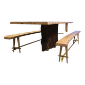 Chestnut and walnut solid table and benches with a central leg.