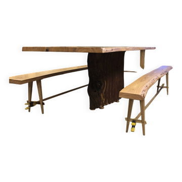 Chestnut and walnut solid table and benches with a central leg.