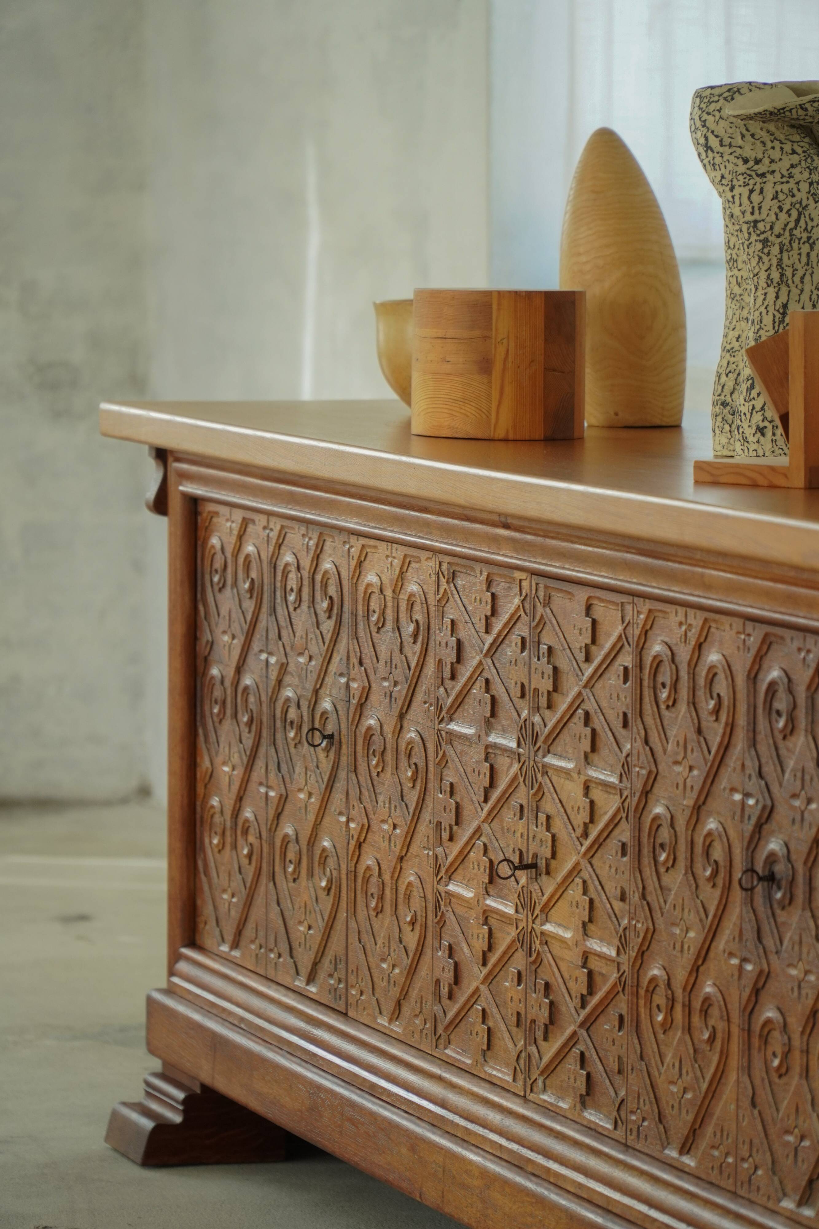 Modern Danish buffet in carved oak, signed Max A. Rasmussen, Denmark, 1940s.