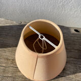 Small cracked white ceramic lamp with flowers.