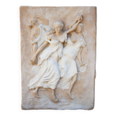 Bas-relief of dancing maenads. Classical relief. Maenads in relief.