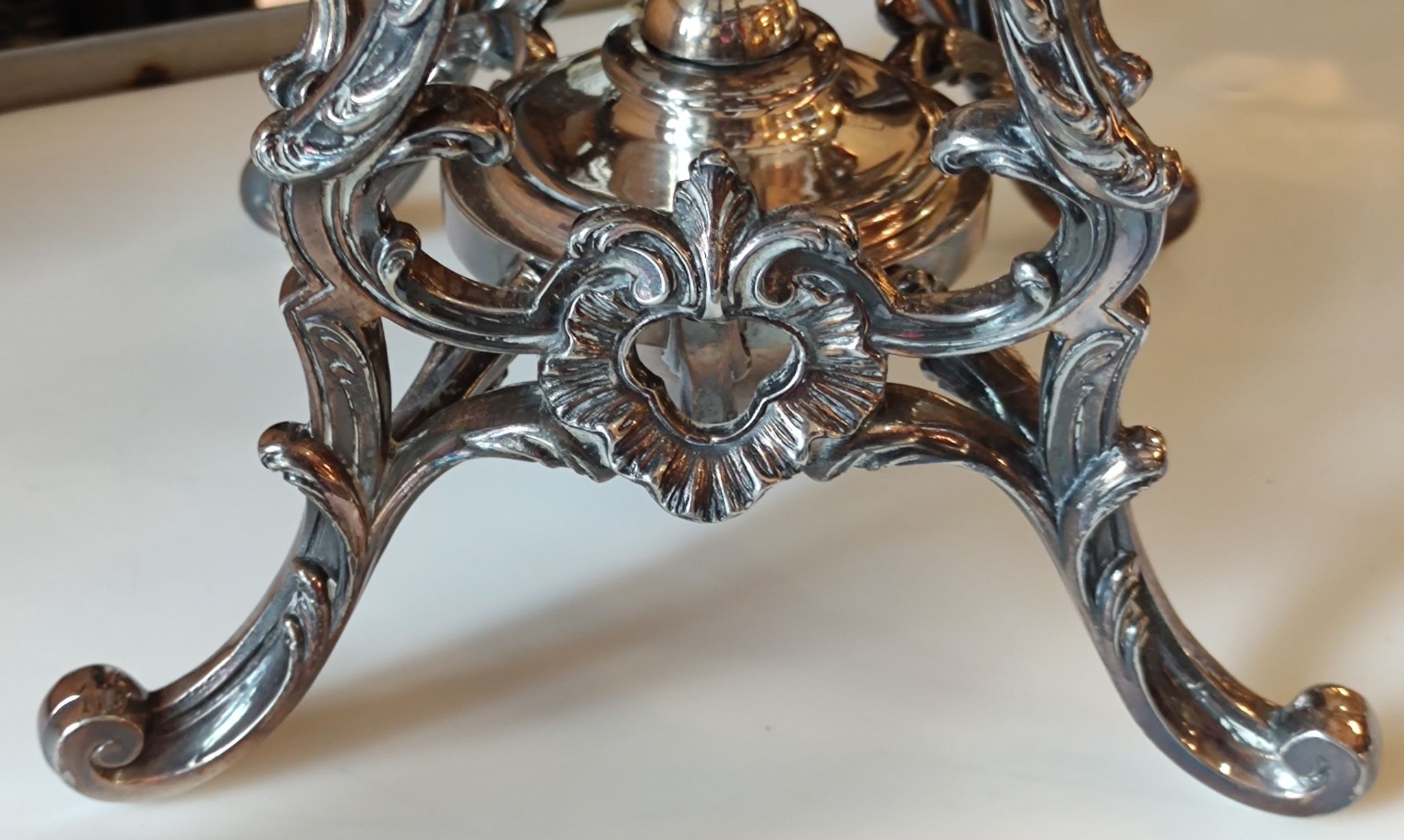 Ancient samovar tea fountain in silver metal