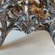 Ancient samovar tea fountain in silver metal