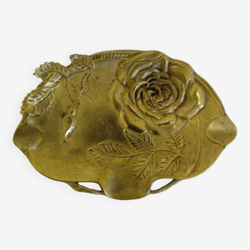 Old ashtray in bronze floral decoration