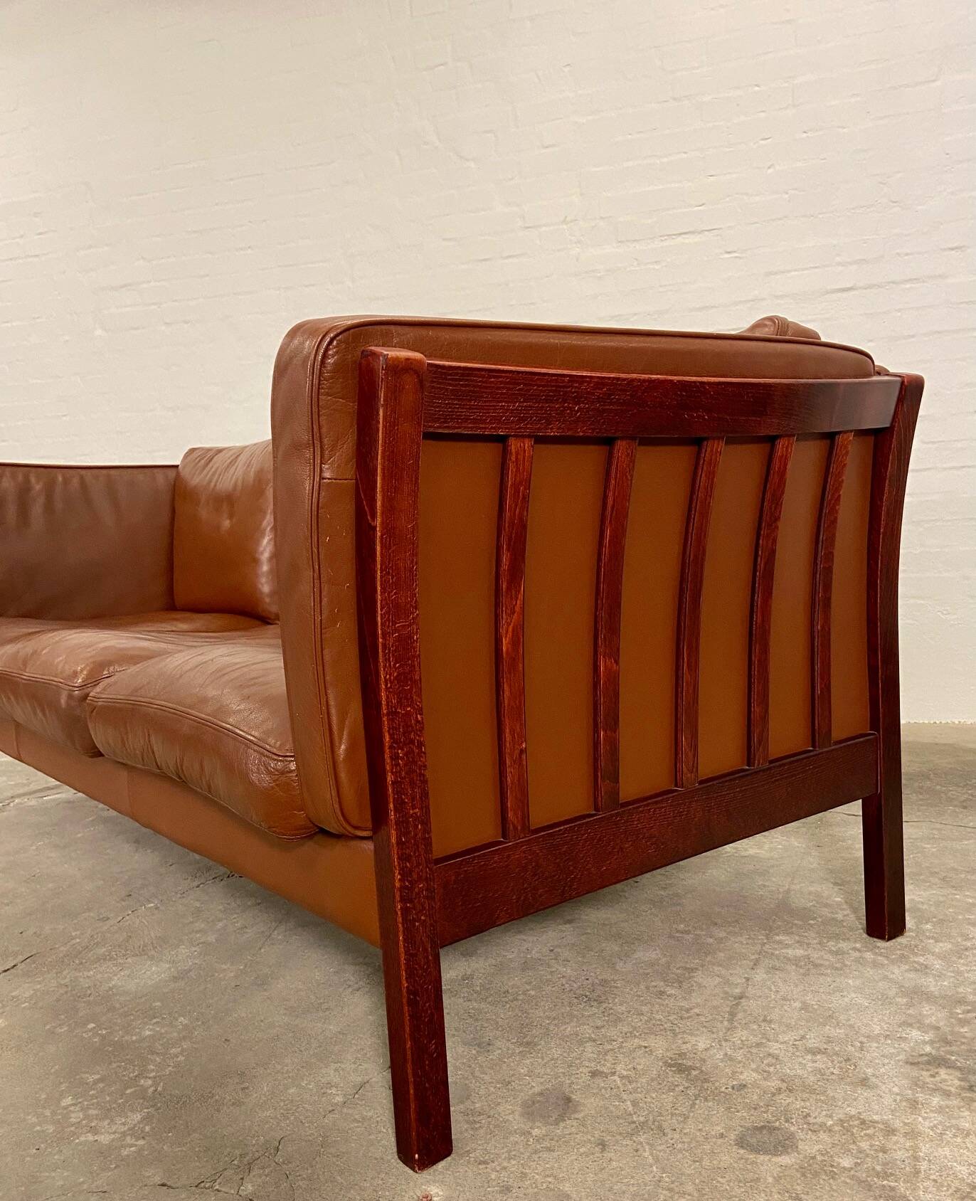 Vintage danish stouby dark cognac leather and rose stained beechwood frame 3 seater sofa