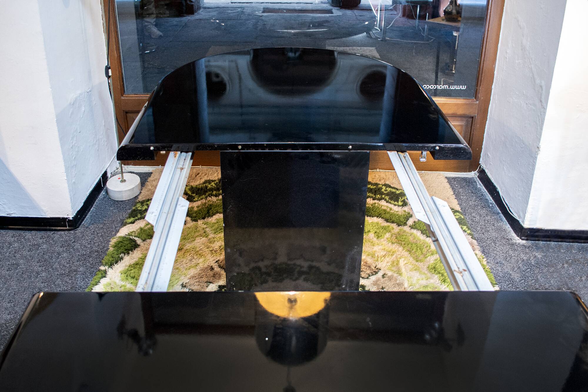 Italian black lacquered wood table from the 1970s