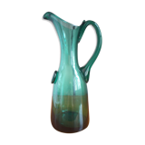 Pitcher made of green glass blown and tinted in the mass