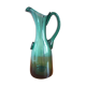 Pitcher made of green glass blown and tinted in the mass