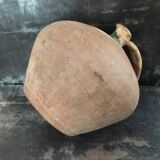 Large old jug cooked buried