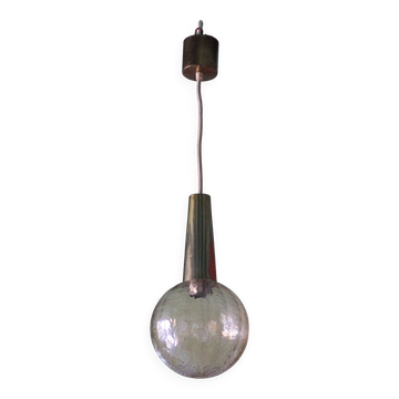 Vintage pendant light, amber glass globe, chandelier, interior decoration.