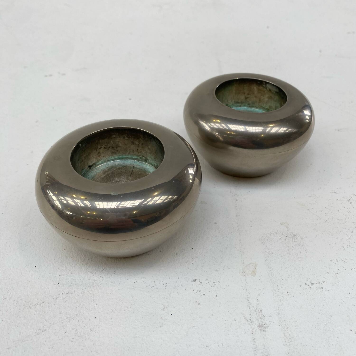 Set of two silver metal candlesticks from the 70s