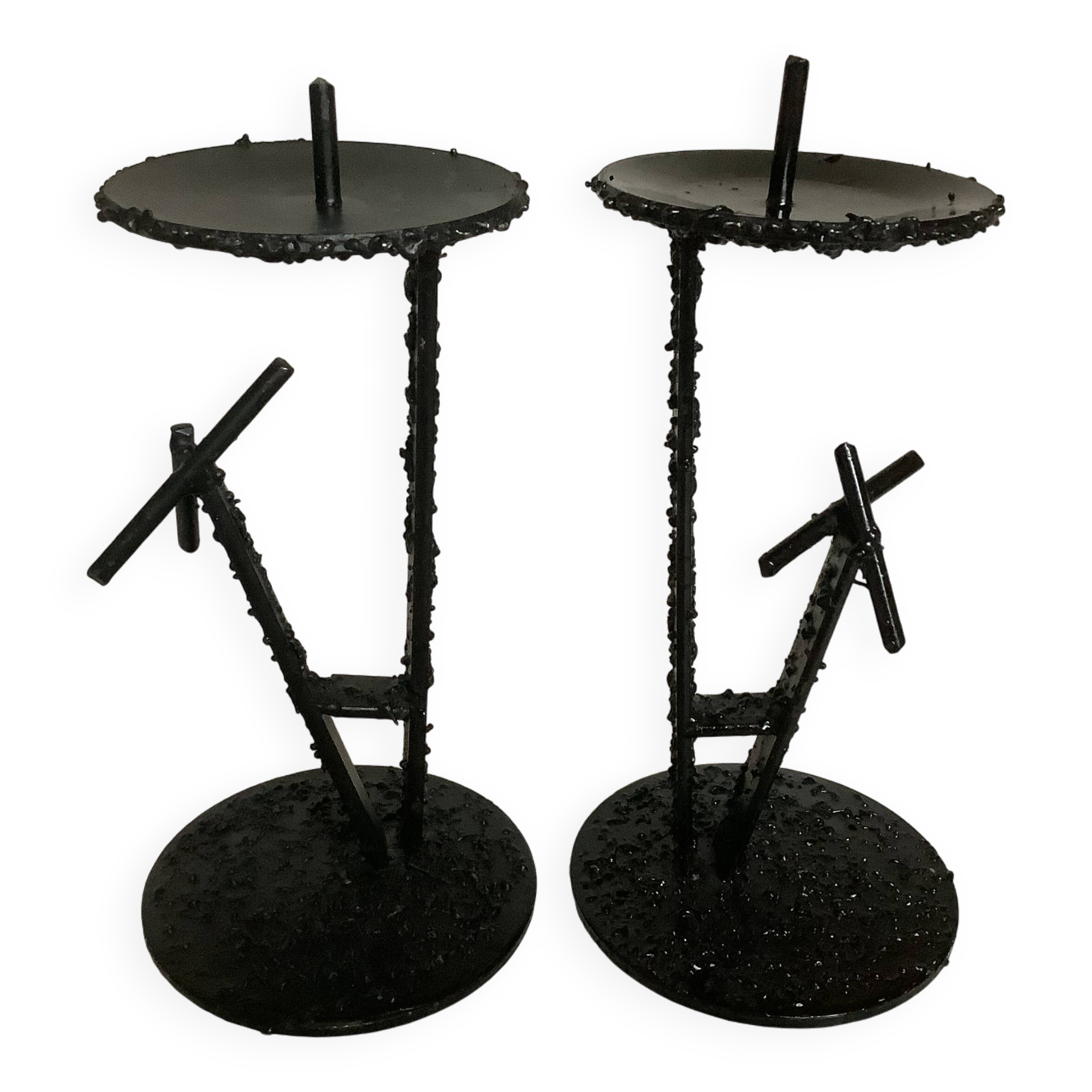 Pair of black metal candlesticks