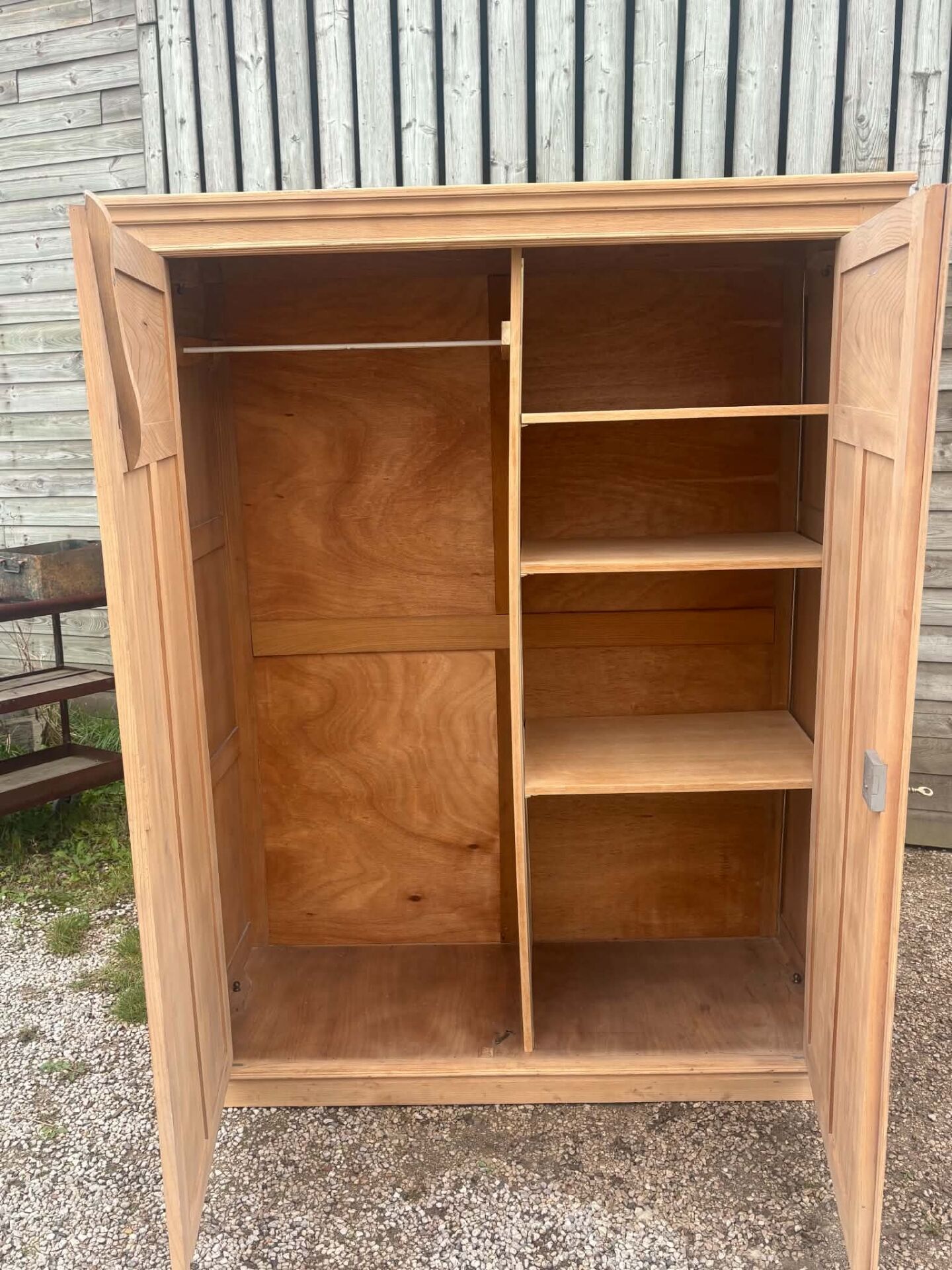 Large antique wardrobe in raw wood