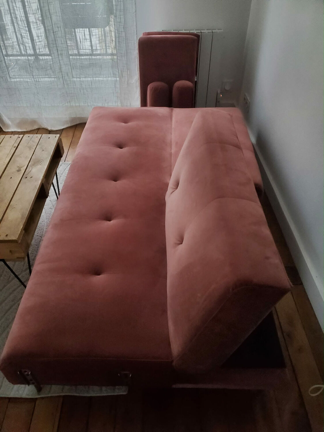 Powder pink convertible sofa