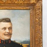 Antique portrait painting of a decorated gentleman with icy blue eyes