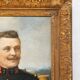 Antique portrait painting of a decorated gentleman with icy blue eyes