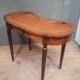 "Kidney" bureau in Louis XVI style veneer.