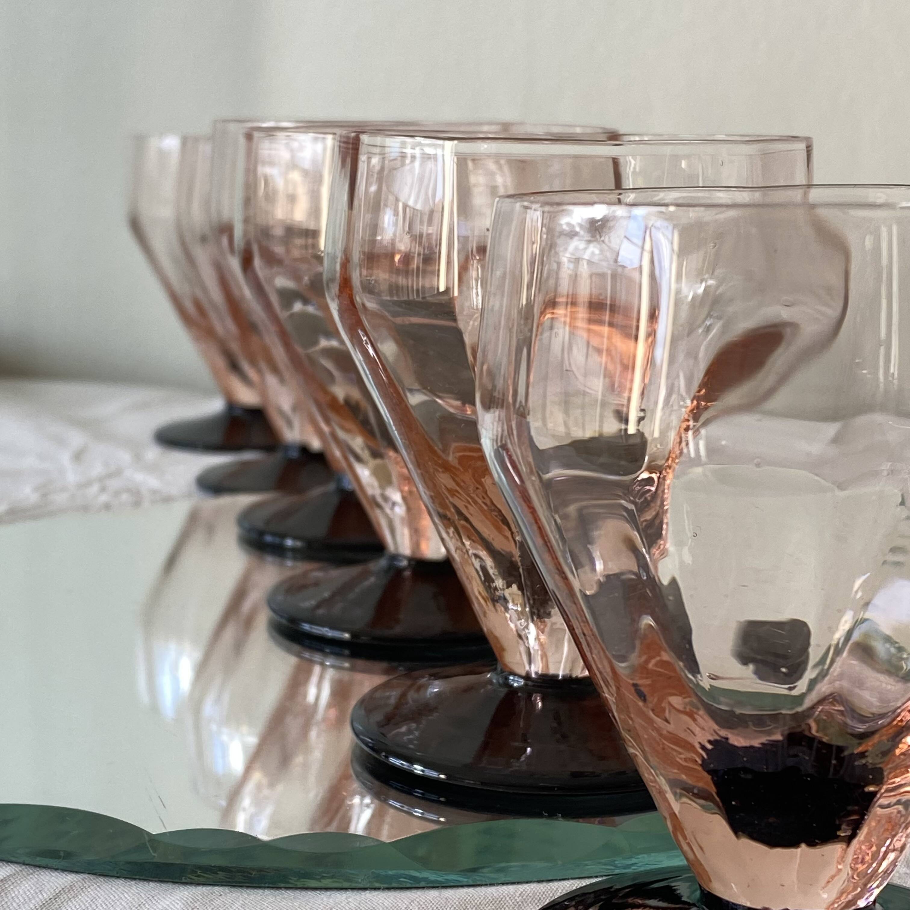 6 Art Deco pink wine or water glasses with black stems.