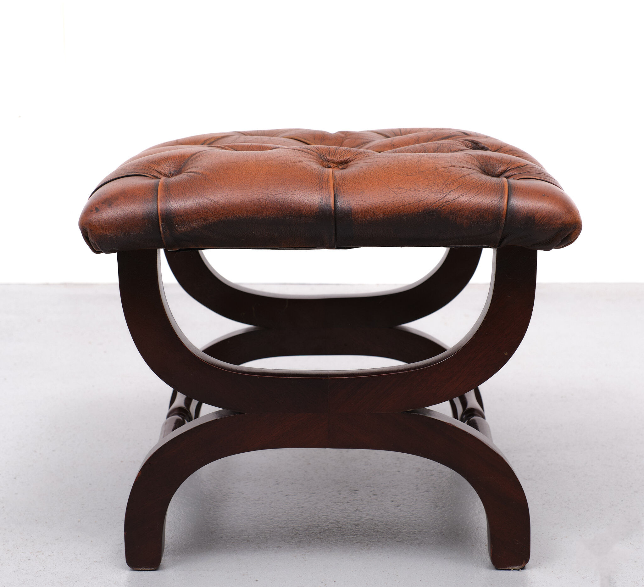 English country house style padded leather ottoman