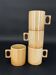 4 speckled beige graphic square-handle stoneware mugs