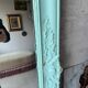 Large antique mercury mirror, patinated blue sculpted frame.