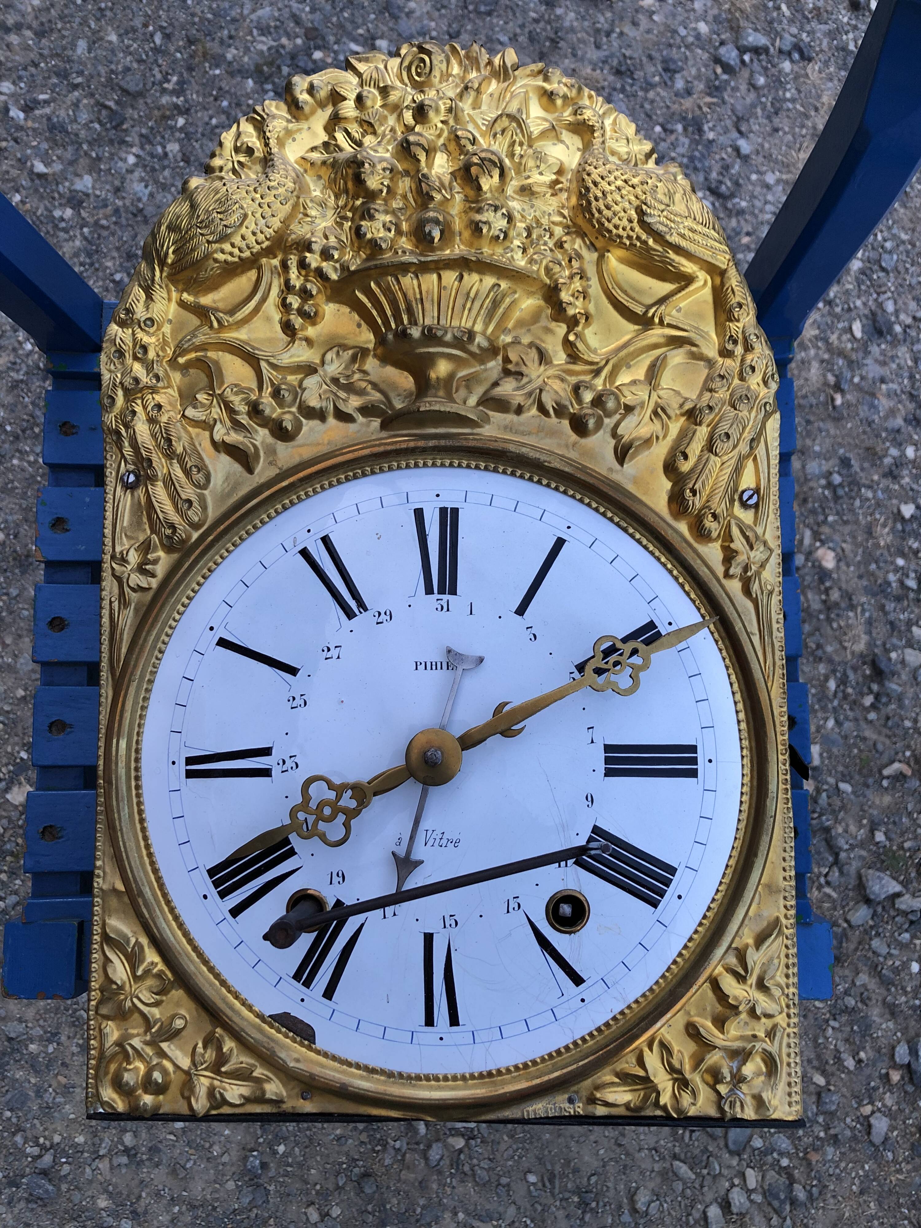 Comtoise clock in cherry style Louis XV period 19th region Fougères.