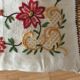 Large hand-embroidered linen cushion.