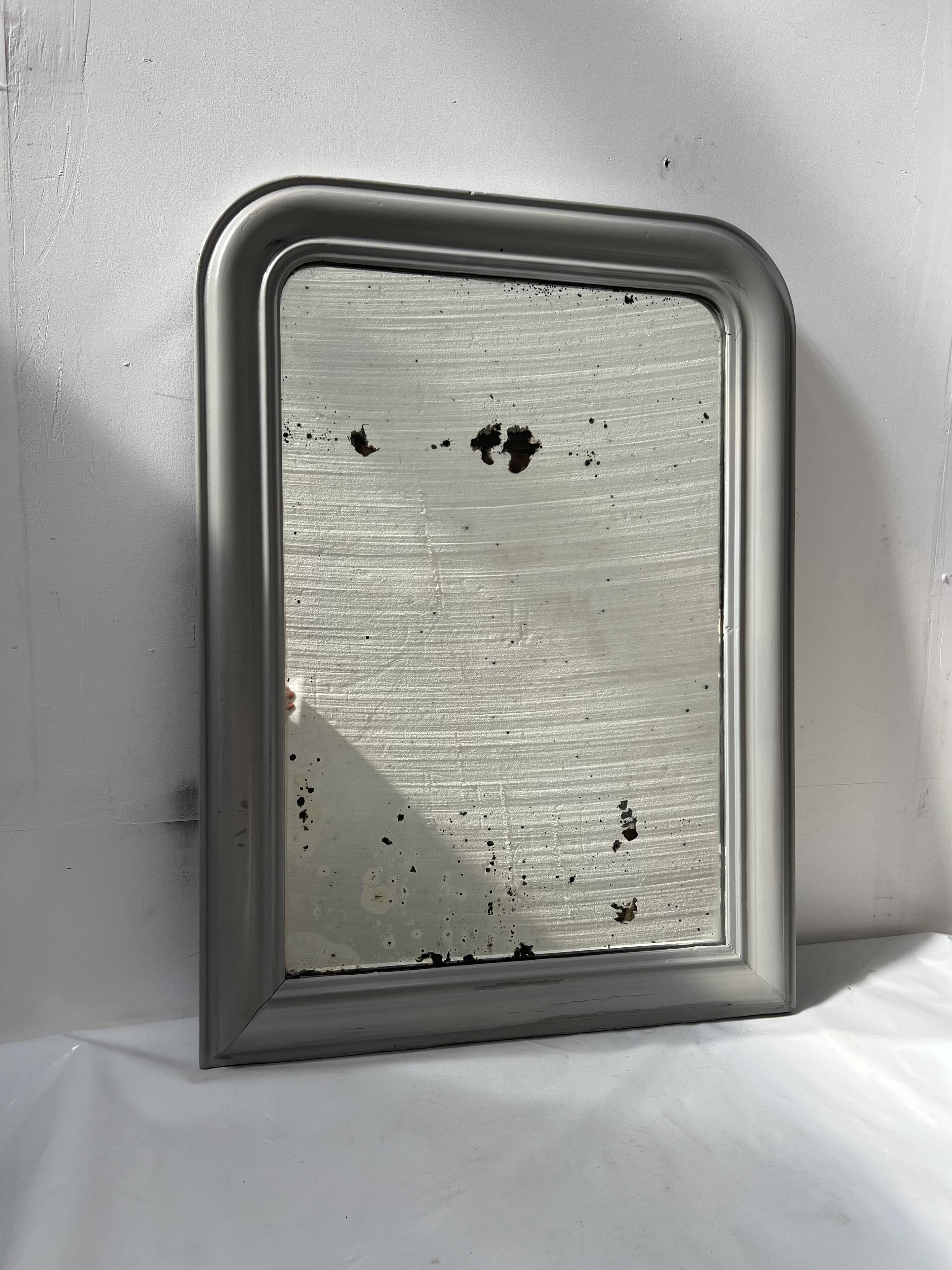 Louis Philippe mirror in wood and patinated stucco, 19th century