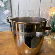 Alpaca champagne bucket from the 1920s with its monopole tongs.