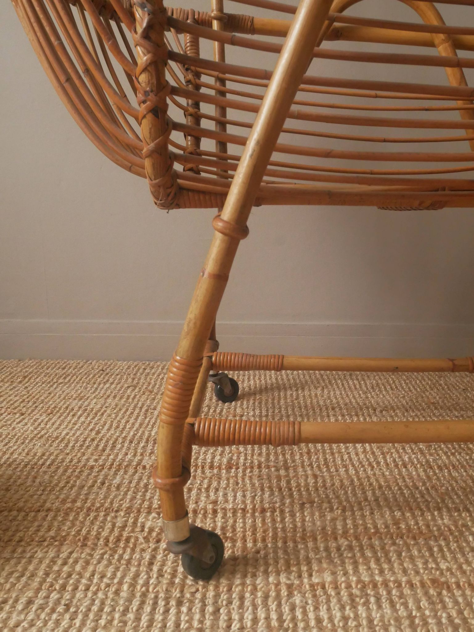 Vintage rattan cradle bassinet on wheels retro Scandinavian design baby bed