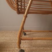 Vintage rattan cradle bassinet on wheels retro Scandinavian design baby bed