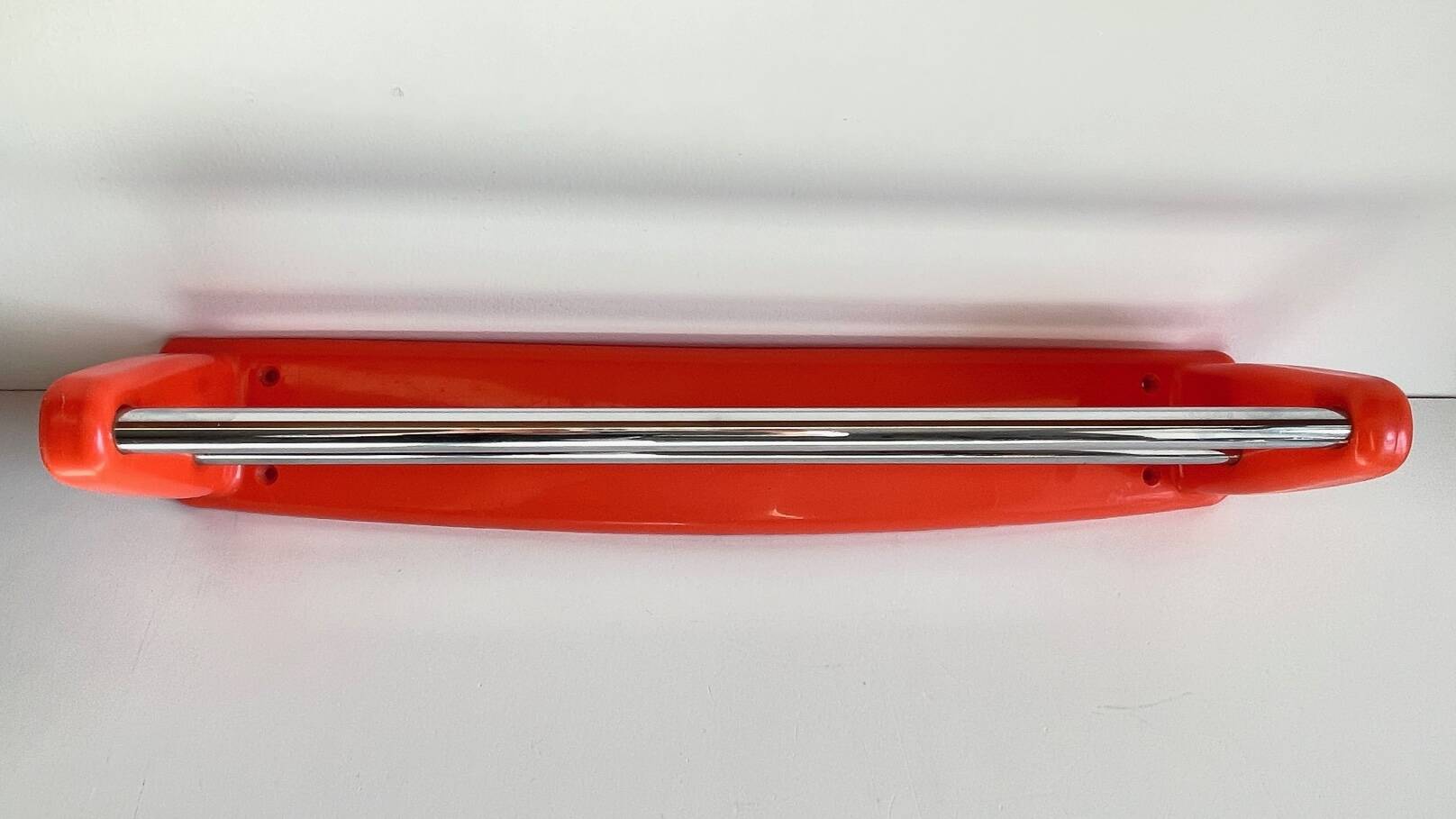 Orange towel rack by Syla from the 70s