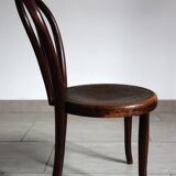 Antique curved wooden children's chair by Fischel, early 20th century.