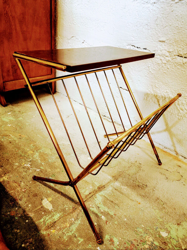 Golden magazine door with tablet