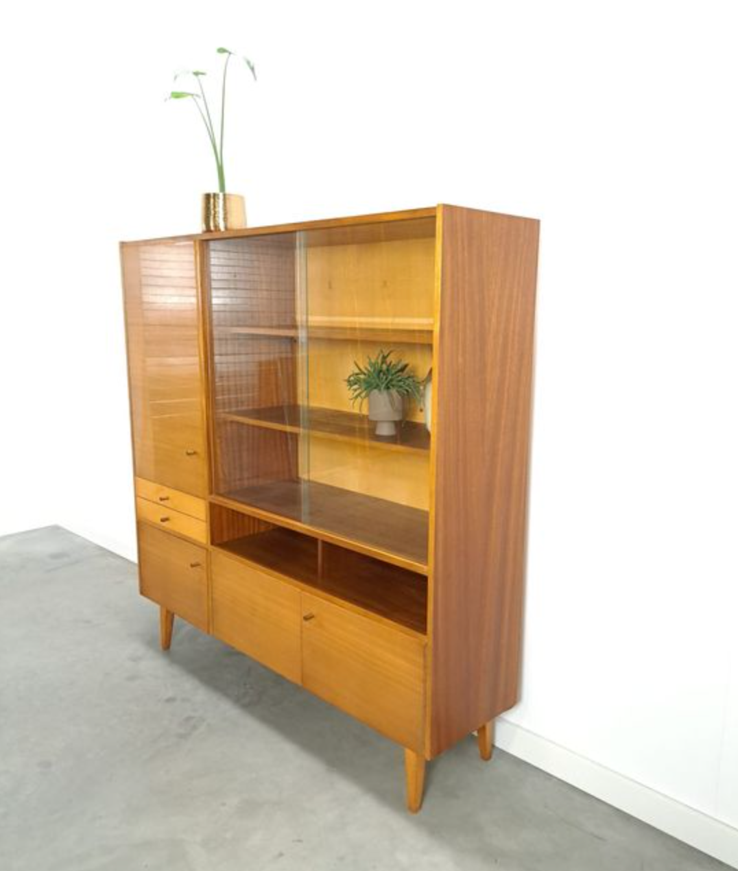 Vintage wooden sideboard with sliding glass doors and drawers